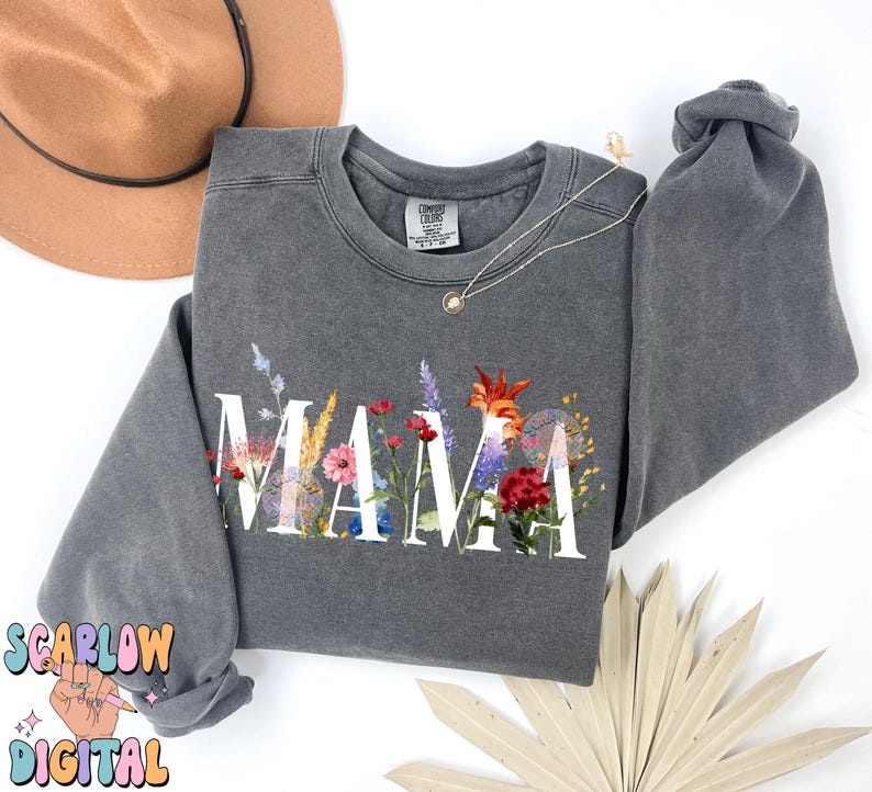 May include: Gray sweatshirt with a floral design spelling out the word "MAMA".