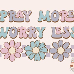 May include: A digital illustration with the text "Pray More Worry Less" in a retro font. The text is in shades of pink, blue, and purple. Three stylized flowers are below the text in pink, blue, and purple.