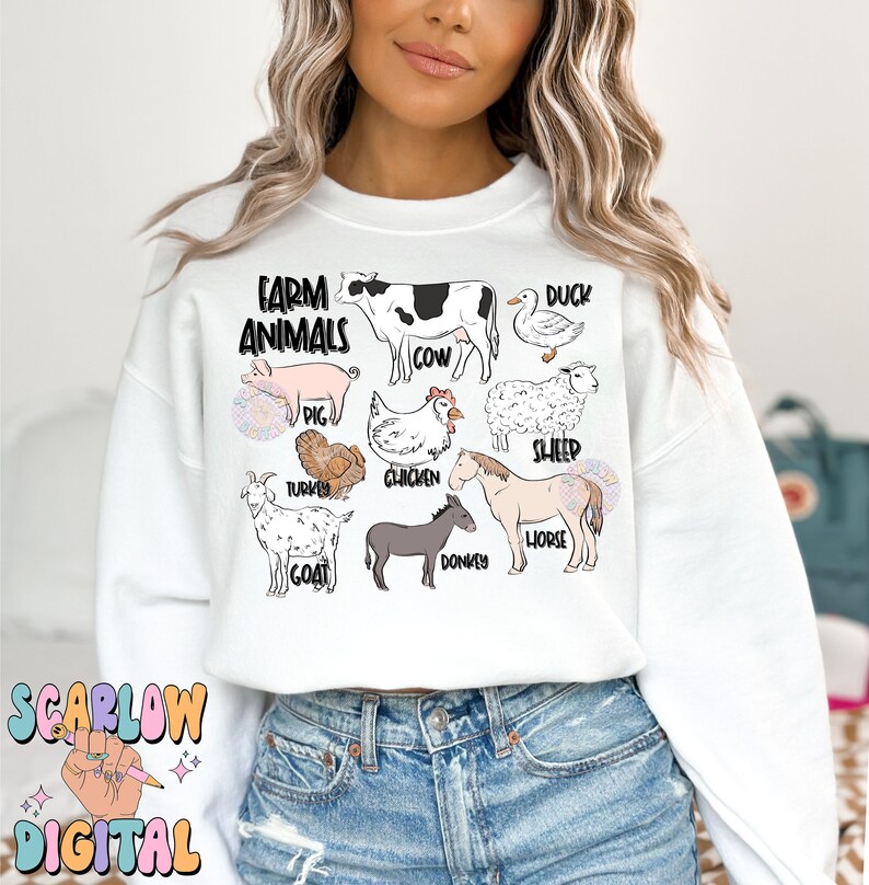 May include: White sweatshirt with a graphic of farm animals, including a cow, pig, chicken, sheep, duck, turkey, goat, donkey, and horse. The text "Farm Animals" is at the top of the graphic.