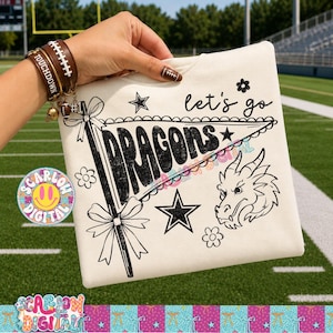May include: A cream-colored sweatshirt featuring a black graphic print of a pennant flag with the word DRAGONS, the text let's go, a dragon head, stars, and flowers. The design has a distressed texture and is printed on the front of the garment.