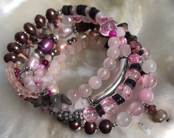 Wide pink boho style bracelet made of natural semi-precious gemstones and freshwater cultured pearls