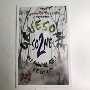 May include: A rectangular program booklet for The Krewe Of Phoenix 5th Annual Ball on Feb. 8th 2014. The cover features a black and white forest illustration with the green and purple text GRUESOME SO2ME and a red phoenix logo at the bottom.