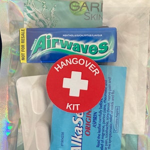 Holographic zip lock bag with hangover kit sticker