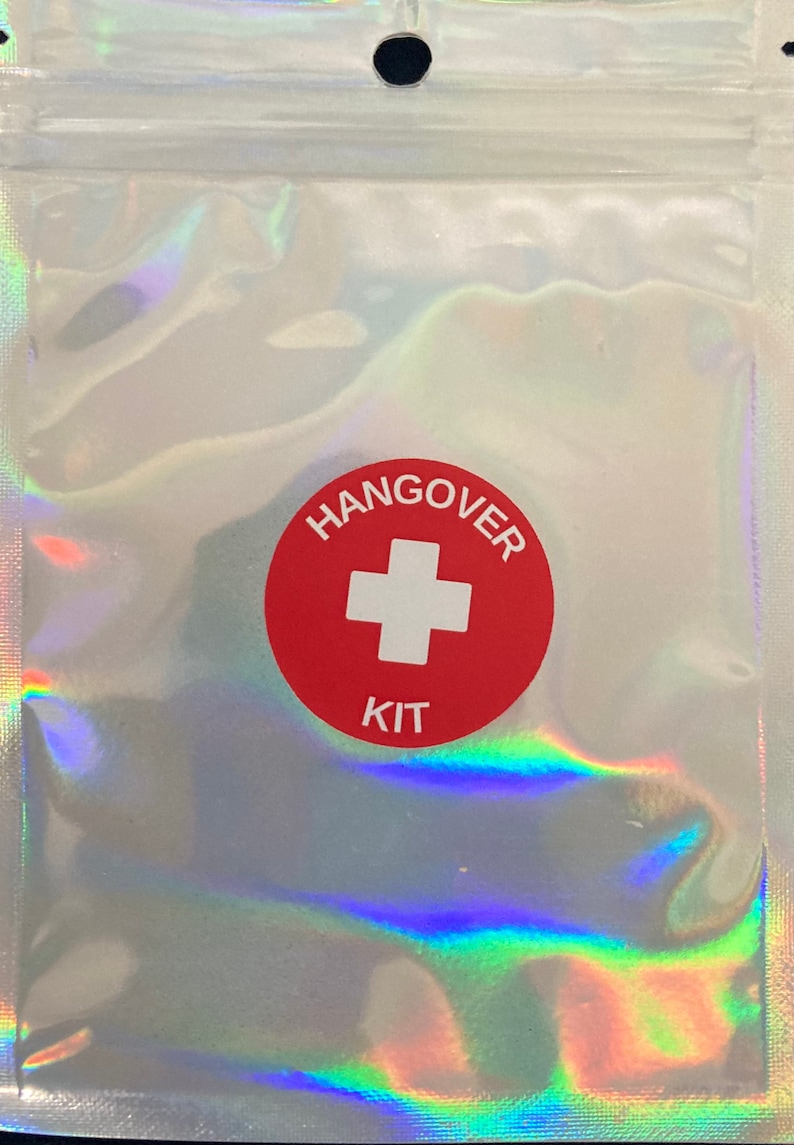 Holographic zip lock bag with red and white hangover kit sticker on the front.