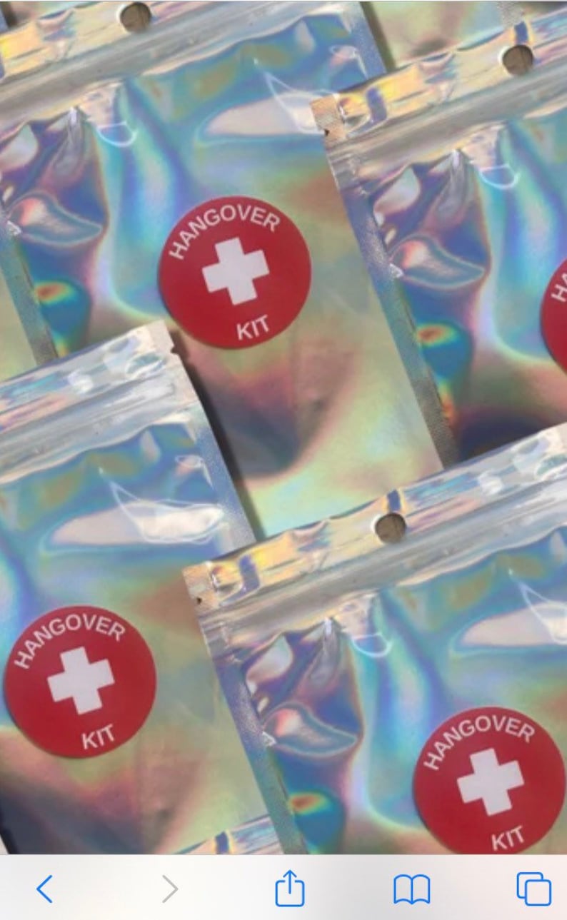 Holographic zip lock bag with red and white hangover kit sticker on the front.