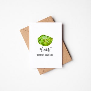 Tarjeta de felicitación con piedra preciosa de acuarela en blanco con diseño de peridoto para el crecimiento de la confianza y el amor