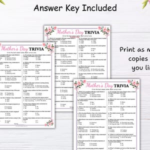 May include: Two printable Mother's Day trivia game cards with pink floral borders. The cards feature questions about Mother's Day, such as the average number of diapers a mother changes in her baby's first year.  The text "Answer Key Included" appears at the top of the page.