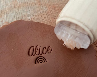 Personalized pottery stamp with name and rainbow. Rainbow ceramic stamp. Customizable ceramic pottery stamp.