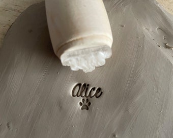 Personalized first name and dog paw pottery stamp. Paw ceramic stamp. Customizable ceramic pottery stamp.