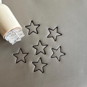 Sello de cerámica con contorno de estrella. Sello cerámico estrella. Sello para cerámica.