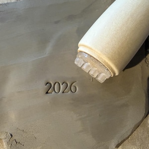 Pottery stamp 2026. Stamp for ceramics, year 2026. Ceramic pottery stamp, date.
