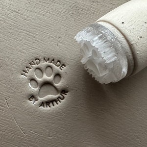 Personalized first name and dog paw pottery stamp. Dog paw ceramic stamp. Customizable ceramic pottery stamp. image 1