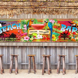 May include: A colourful beach bar sign with the text "Nick & Kat's Beach Bar" and the tagline "Let's Get Freaky". The sign also includes a tropical sunset, parrots, a flamingo, and the text "Partying Since 2017".
