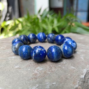 Close-up of Lapis Lazuli beads showing natural marbling and shine