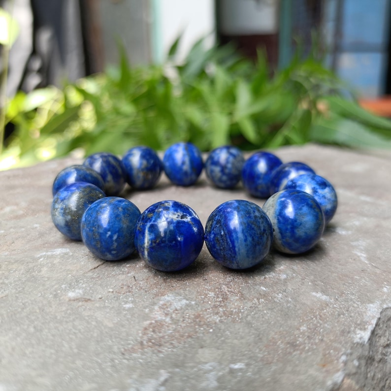 Close-up of Lapis Lazuli beads showing natural marbling and shine