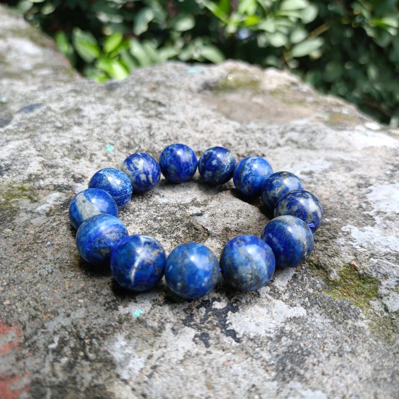 Unisex handmade Lapis Lazuli bracelet styled with minimal attire