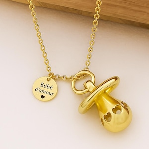 Handmade pregnancy bola in the shape of a pacifier with personalized initial medal, personalized engraved mini bola, future mother gift