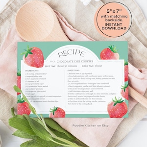 May include: Printable recipe card with a green background and strawberry illustrations. The card features a recipe for chocolate chip cookies with a prep time of 1 hour and 30 minutes and a cook time of 1 hour. The card is 5 inches by 7 inches and includes a matching backside. The text "FoodiesKitchen on Etsy" is at the bottom of the card.