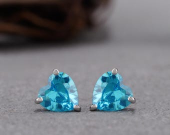 Light blue man made diamond Studs in Sterling Silver. Upto 2.1 carat total weight. unisex earring studs. Round and heart shaped earring stud
