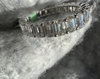 4.12 ct natural emerald cut diamond eternity band in 18kt white gold. Natural diamond wedding band. VS quality diamond eternity band for her