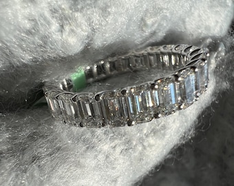 4 carat plus emerald cut diamond eternity band. White gold diamond wedding band. Luxury diamond wedding band. Emerald cut lab grown diamonds