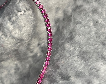 Delicate sterling silver bracelet with pink gemstone. Pink tennis bracelet with adjustable length. Perfect gift. Bracelet with charm.