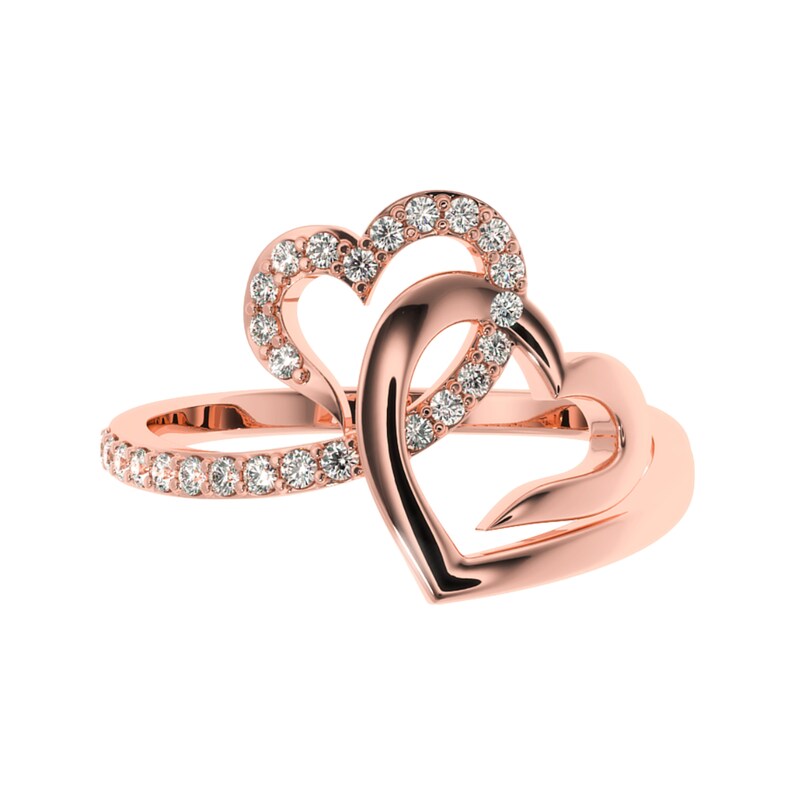 May include: A rose gold ring with two interlocking heart designs. The hearts are set with small, clear diamonds.
