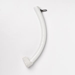 May include: A curved, white, painted metal object with a textured end and a small, dark metal loop at the top. The object is set against a plain white background.