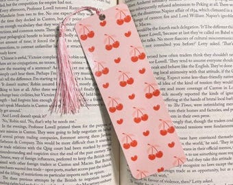 Marcador de livros em formato de cereja com laço rosa: um presente fofo para amantes de livros.