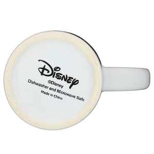 Underside view of the Mickey Mouse Swimming Mug Disney showing the logo and safety information