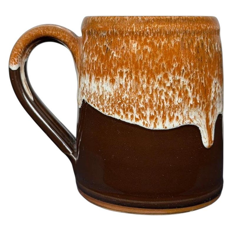 Vintage Deneen Pottery mug featuring Ronald Reagan Rancho Del Cielo design with earthy brown tones