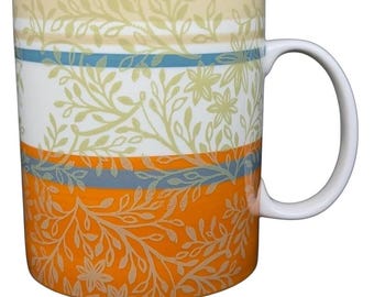 Taza de Starbucks con estampado floral naranja y hojas zen de 14 oz (2008)