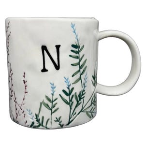 Dagny Letter 'N' Monogram Mug Anthropologie with floral design and an elegant handle