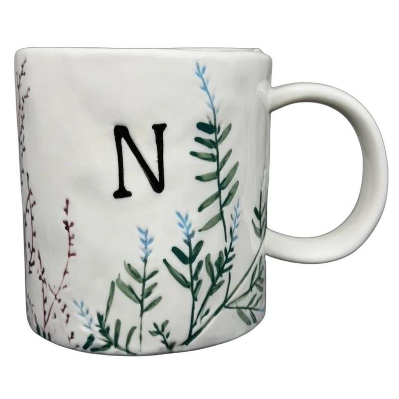 Dagny Letter 'N' Monogram Mug Anthropologie with floral design and an elegant handle