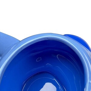 Interior view of a blue Stitch 3D Collectible Shaped Mug Disney showcasing its unique design