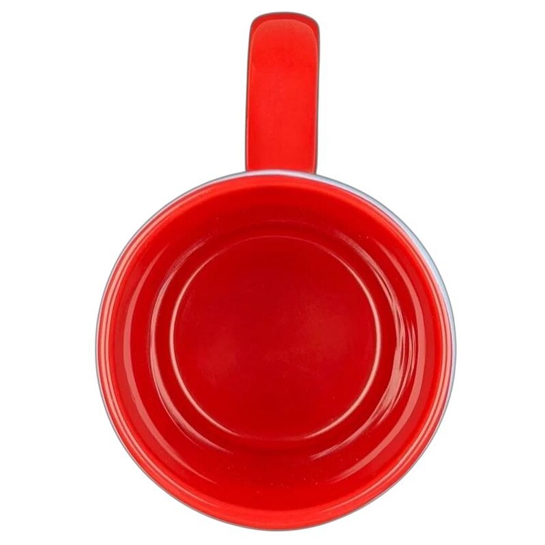 Inside view of a red Mickey Mouse embossed stars Disney mug with a glossy finish