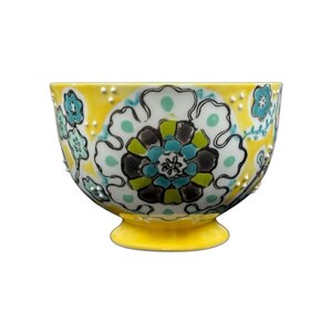 Anthropologie Elka Ayaka floral pedestal mug yellow hand painted ceramic mug with turquoise green floral design on pedestal base