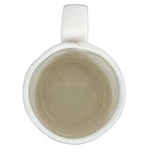 Inside view of Anthropologie Dagny T monogram initial mug showcasing its elegant design and smooth finish