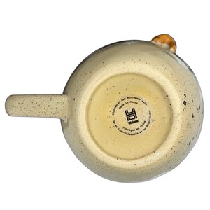Daisy Garland vintage Mug 3D Dog Urban Outfitters with a speckled design and unique handle detail