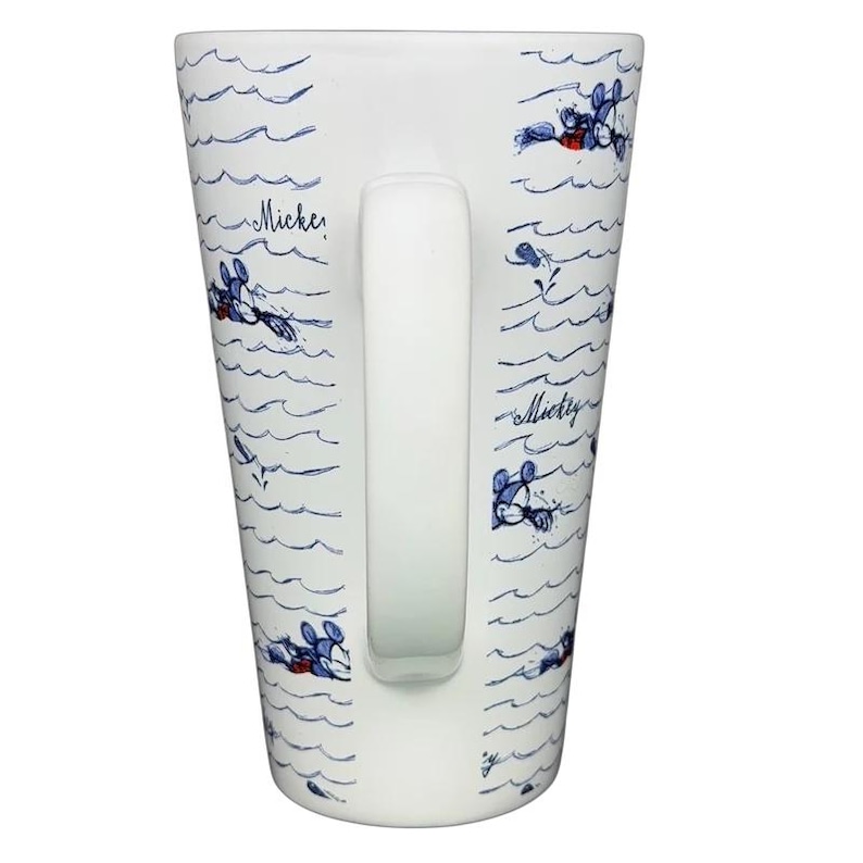 Mickey Mouse Swimming Mug Disney featuring playful design of Mickey Mouse in water