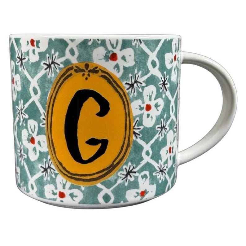 Anthropologie Alexandre Dumas G monogram initial mug green floral ceramic cup with yellow oval monogram