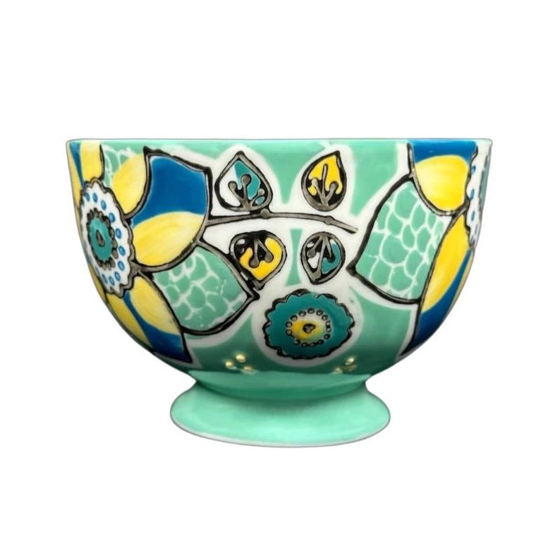 Anthropologie Elka Ayaka green floral pedestal mug hand painted ceramic footed cup with blue and yellow flowers
