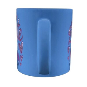 Disney collectible Stitch mug purchase featuring vibrant colors and playful heart designs