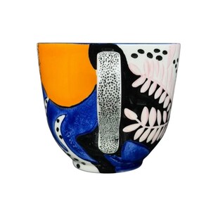 Colorful Cassie Byrnes Anthropologie Mug featuring abstract patterns and a unique shape