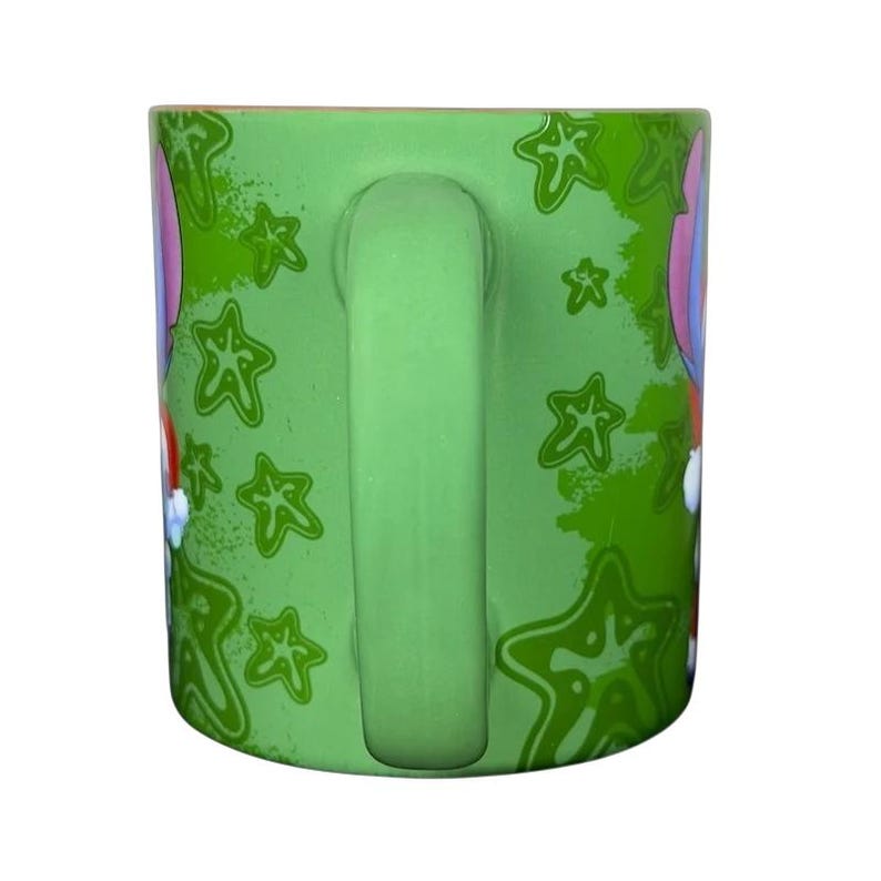 Disney Stitch Santa holiday collectible mug featuring vibrant green design with festive stars