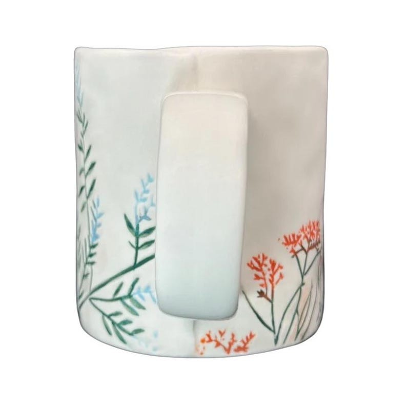 Anthropologie Dagny T monogram initial mug with floral design and unique handle