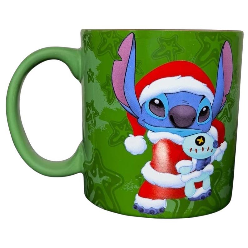 Disney Stitch Santa holiday collectible mug featuring Stitch in a Santa outfit holding a small character