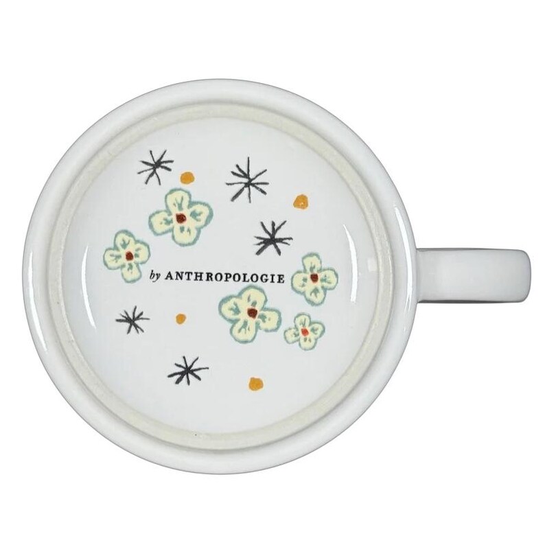 Alexandre Dumas G monogram initial mug white ceramic top view with green floral interior print by Anthropologie
