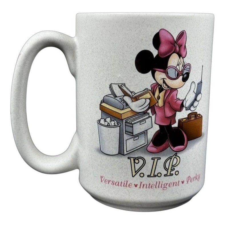 Disneyland Minnie Mouse VIP vintage mug featuring a stylish Minnie with a pink outfit and accessories