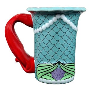 Ariel The Little Mermaid Disney Parks vintage mug turquoise mermaid scale pattern red handle pearl trim shell motif